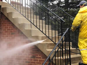 Close-up of a person doing pressure cleaning
